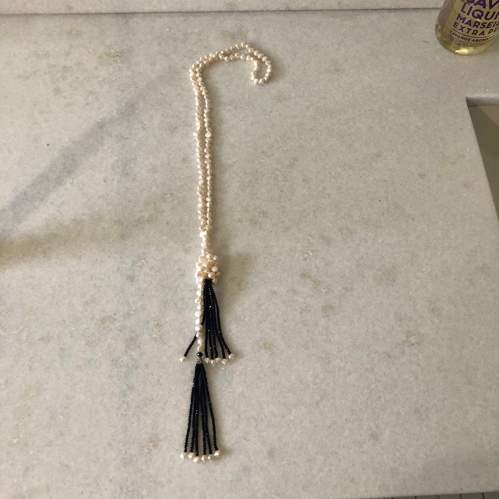Beaded necklace with black tassels